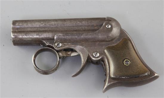 A Remington Elliots Patent 1860 and 1861 revolving rim fire four-barrel Deringer,